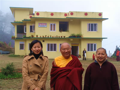 Jetsün Dechen Paldrön, HE Khochhen Rinpoche and Jetsün Khandro Rinpoche in front of the medical clinic at Lava.