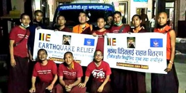 Monks gather for a photo before departing to earthquake area.