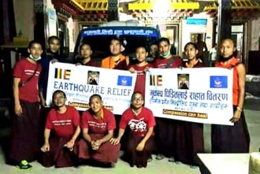 Monks gather for a photo before departing to earthquake area.