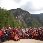 HE Jetsun Khandro Rinpoche, Minling Sangyum Kushok, Jetsun Kushok, Dungse Jigdral, Jetsun Gautami, Kunda Britton, monks and nuns of Mindrolling and sangha members gather at the base of Taktsang in Bhutan.